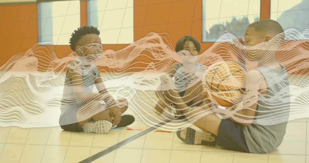 Youthful Team Gathering in Gym with Basketball Connection
