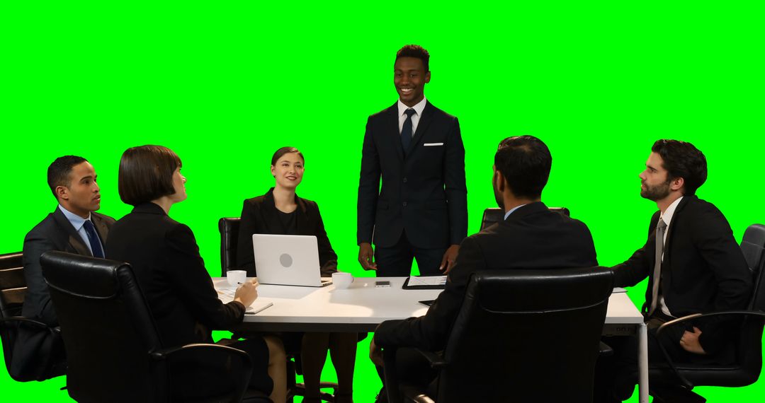 Business Meeting with Team Members in Professional Attire Against Green Screen - Free Images, Stock Photos and Pictures on Pikwizard.com