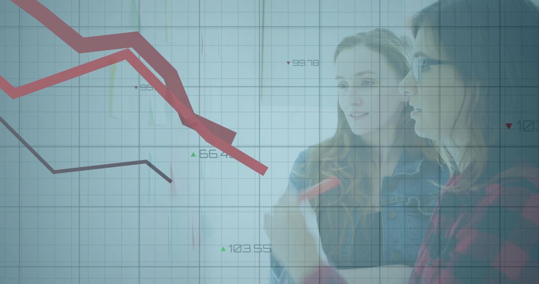 Women Analyzing Business Decline on Digital Graph Interface