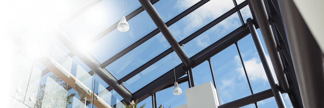 Modern Skylight with Transparent Glass and Blue Sky View