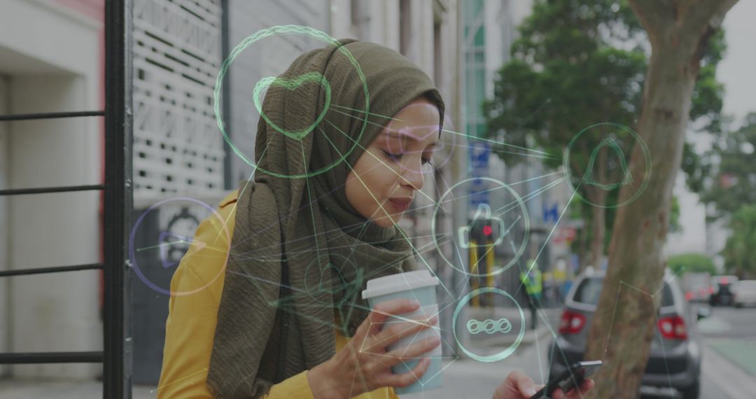 Woman in Hijab Using Smartphone with Social Media Connections Displayed