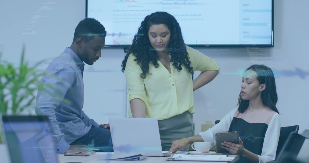 Team Analyzing Data in Modern Office Environment