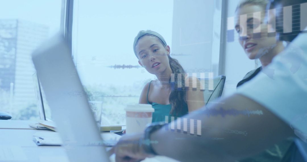 Diverse Business Team Analyzing Financial Data Overlays