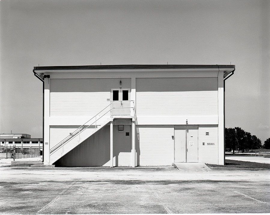 Exterior View of Minimalist Warehouse Annex on Clear Day - Free Images, Stock Photos and Pictures on Pikwizard.com