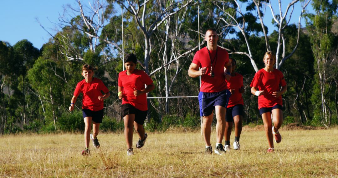 Coach Leading Adolescents in Outdoor Fitness Training Session - Free Images, Stock Photos and Pictures on Pikwizard.com