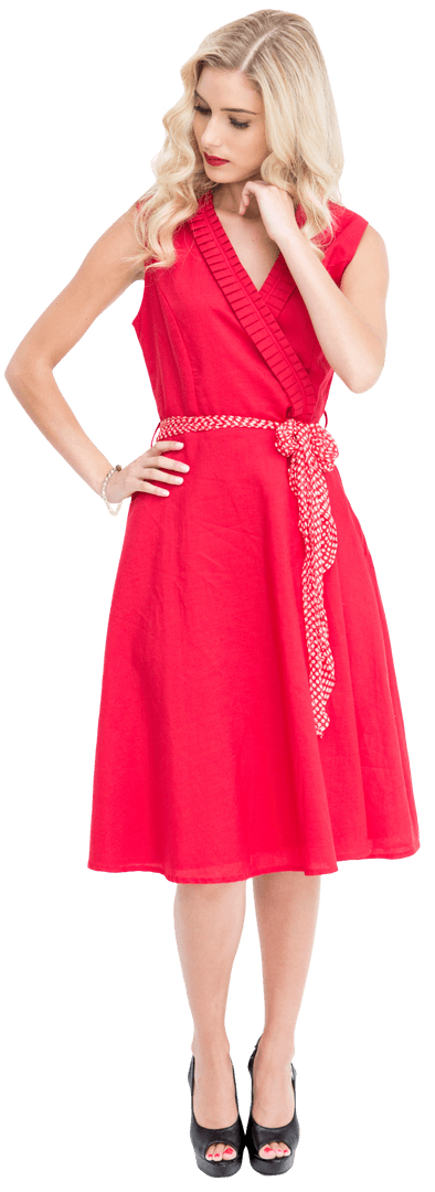 Elegant Blonde in Transparent Red Dress with Polka Dot Belt