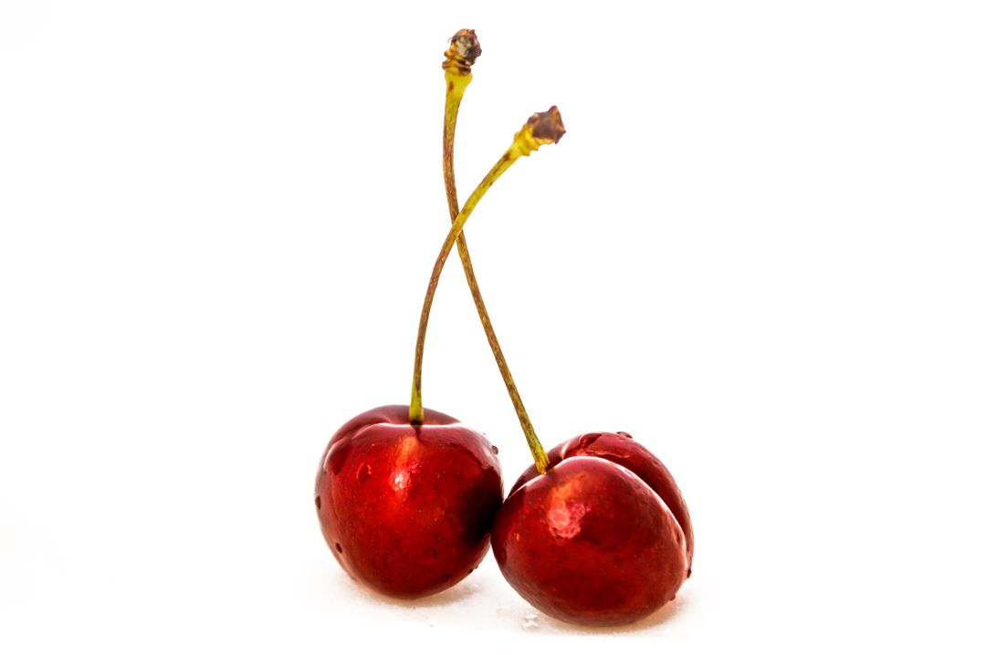 Two Fresh Red Cherries on White Background - Free Images, Stock Photos and Pictures on Pikwizard.com