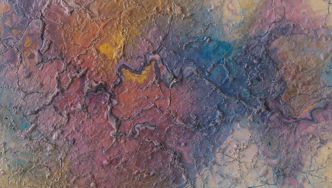 Cracked Colorful Textured Surface Close-Up Revealing Iridescent Raised Ridges and Grooves