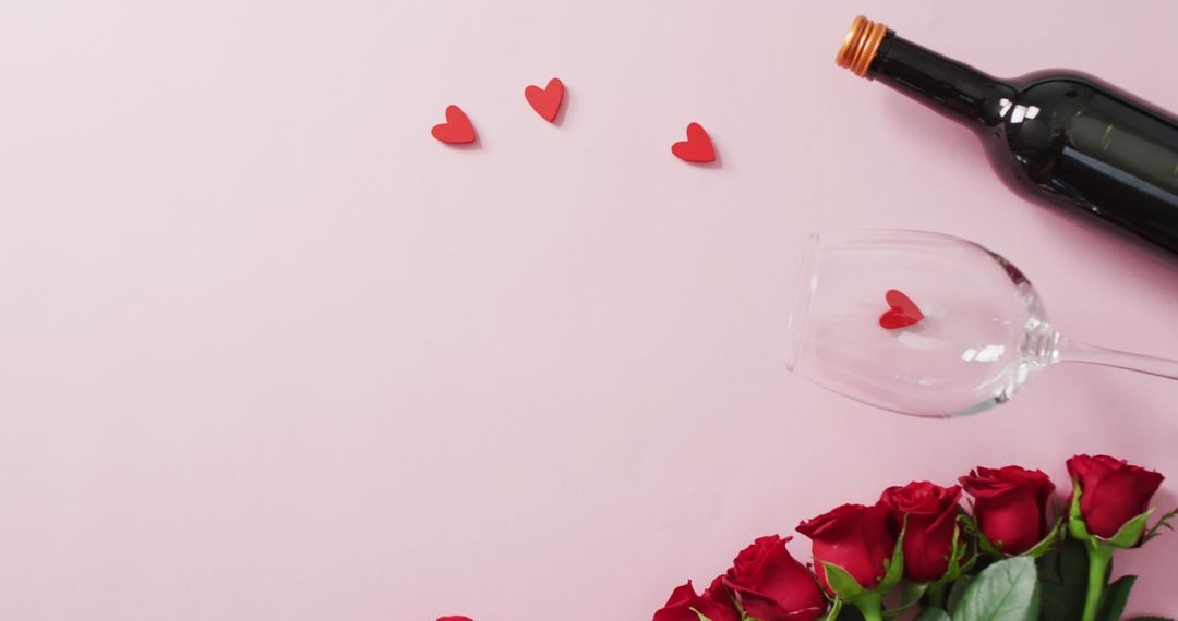 Romantic Red Roses with Wine on Pink Add Elegance for Valentine's Day