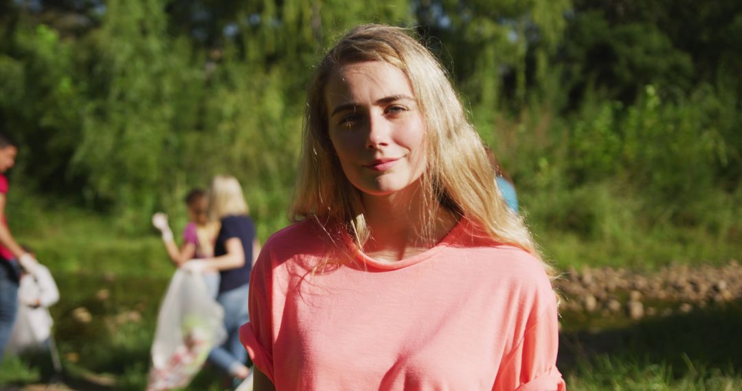 Young Woman Volunteering in Environmental Cleanup Initiative - Free Images, Stock Photos and Pictures on Pikwizard.com