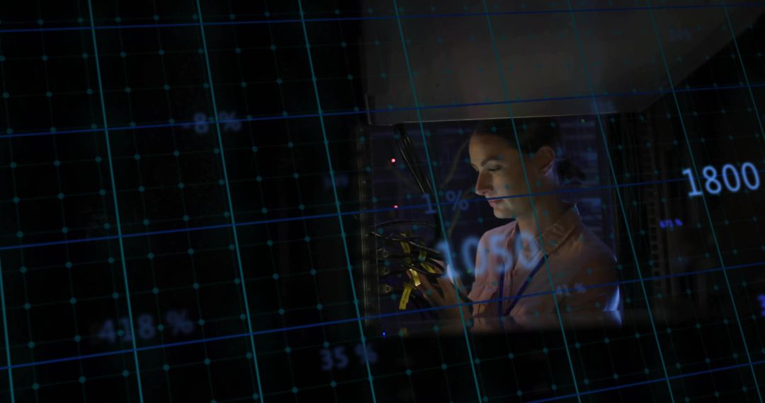 Technician Adjusting Server Rack with Digital Data Overlay