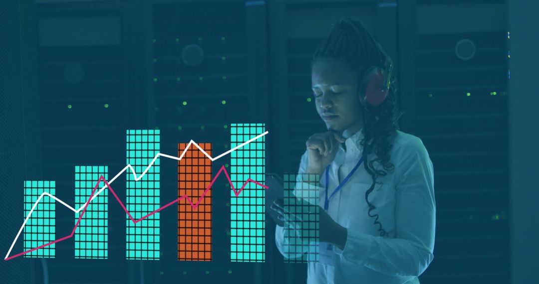 IT Professional Analyzing Data Visualization Amidst Servers
