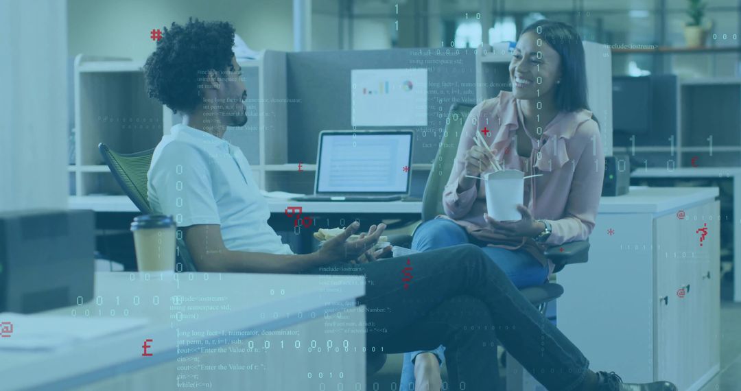 Colleagues Sharing Lunch in Modern Workspace