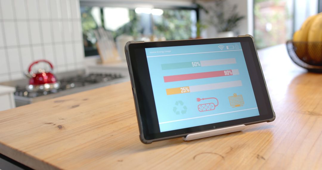 Tablet Displaying Energy Consumption Dashboard in Modern Kitchen - Free Images, Stock Photos and Pictures on Pikwizard.com