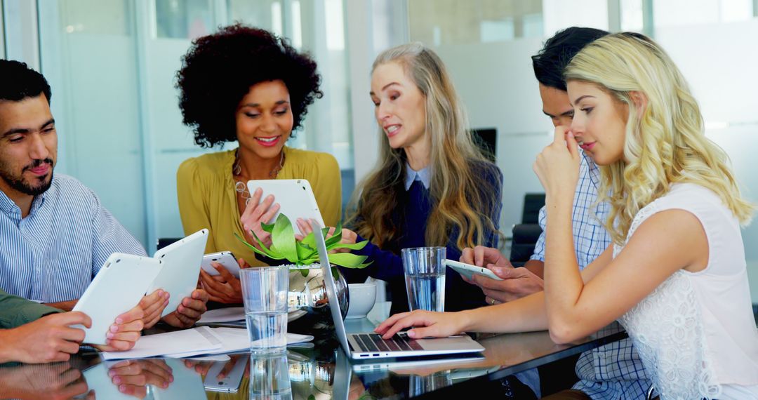 Diverse Team Collaborating in Tech-Savvy Meeting