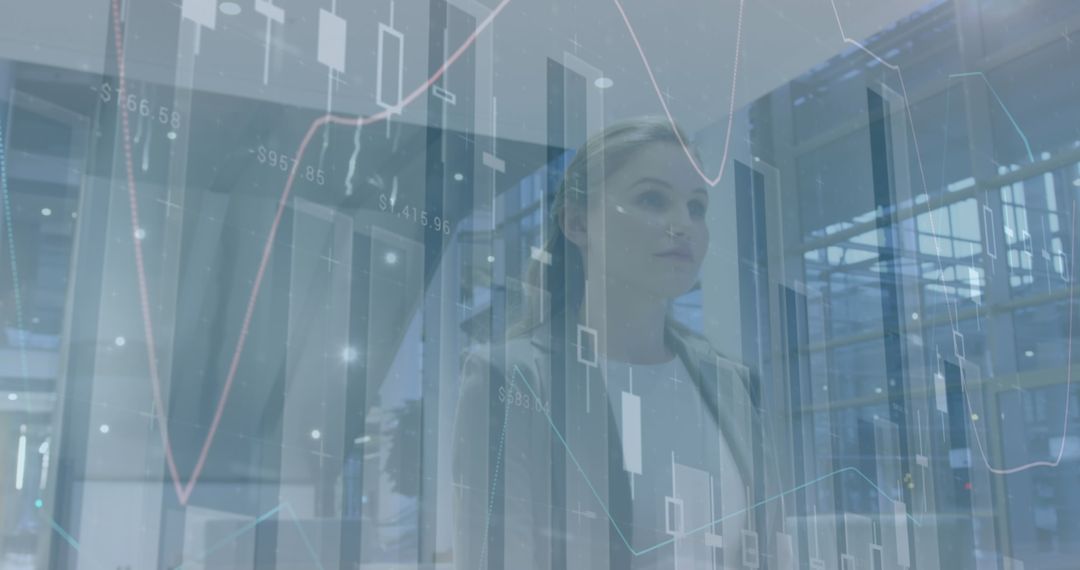 Businesswoman Analyzing Financial Graphs and Data Visualizations