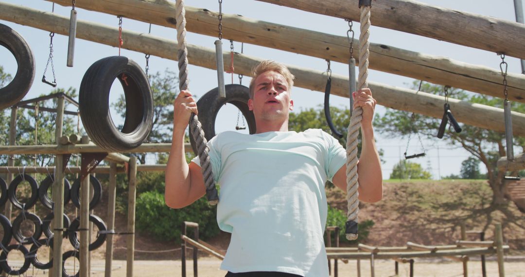 Man in Athletic Gear Training on Outdoor Obstacle Course - Free Images, Stock Photos and Pictures on Pikwizard.com