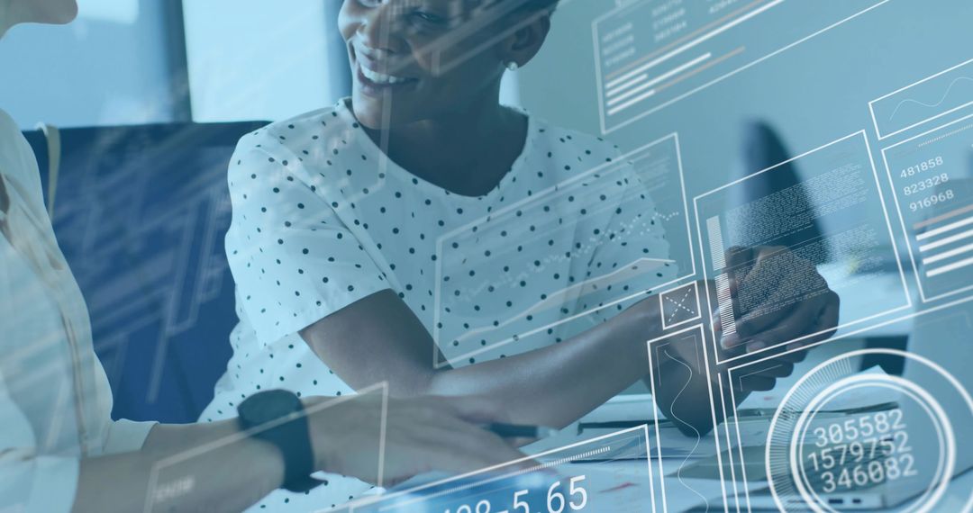 Colleagues Analyzing Data on Digital Interface