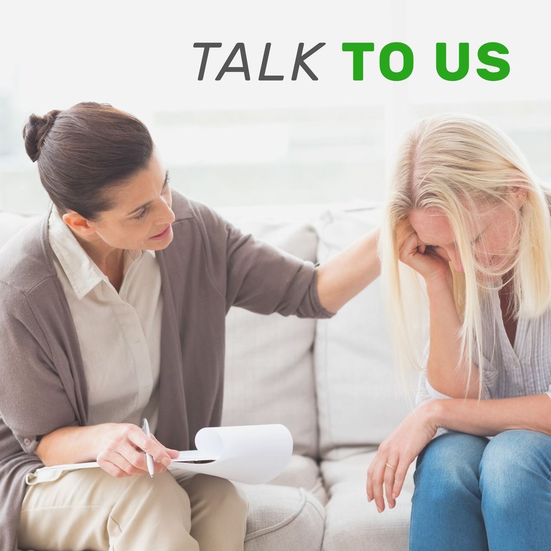 Professional Counselor Supporting Distressed Woman in Therapy