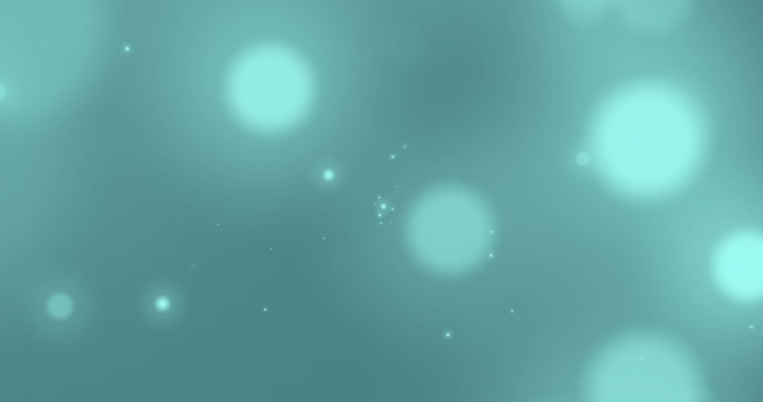 Glowing Light Spots on Green Background Abstract