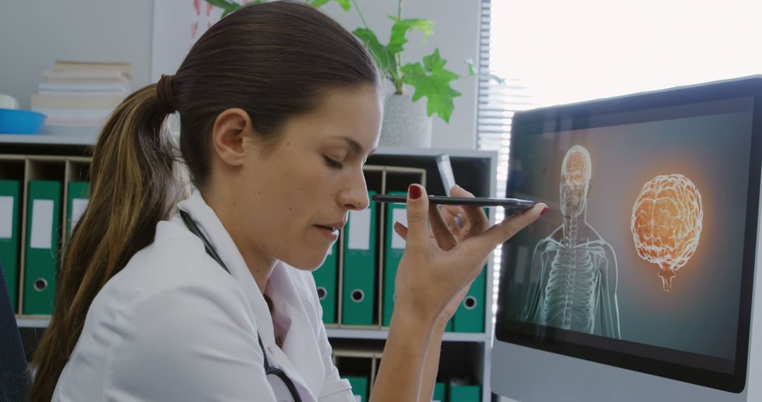 Caucasian woman reviews medical scans in an office - Free Images, Stock Photos and Pictures on Pikwizard.com