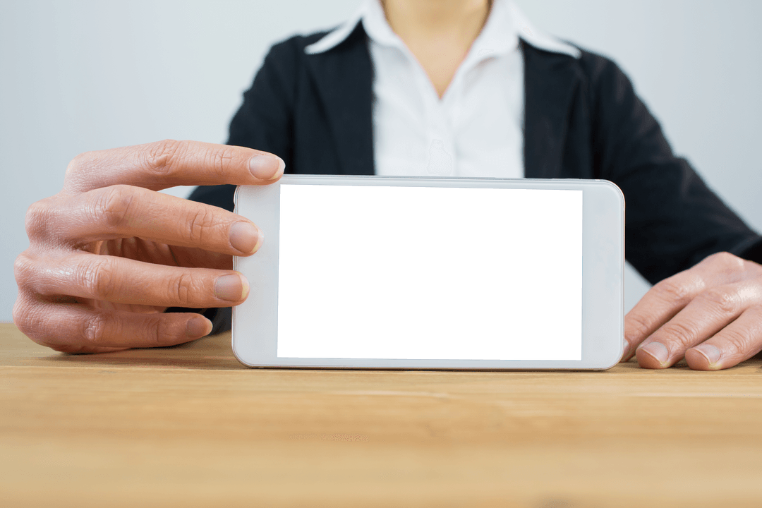 Businesswoman Holding Transparent Tablet on Desk