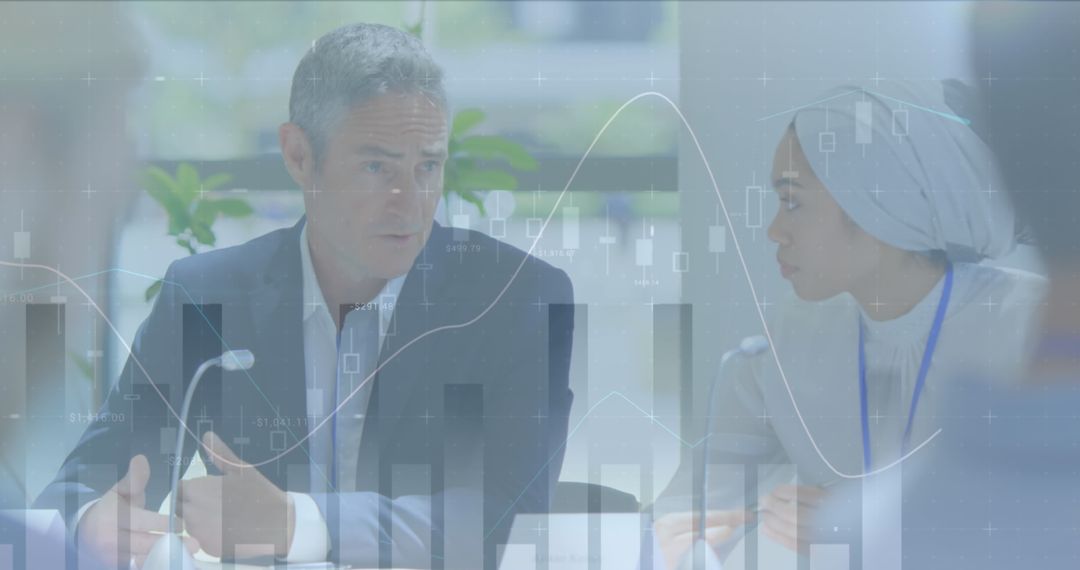 Diverse Business Team Analyzing Data in Meeting