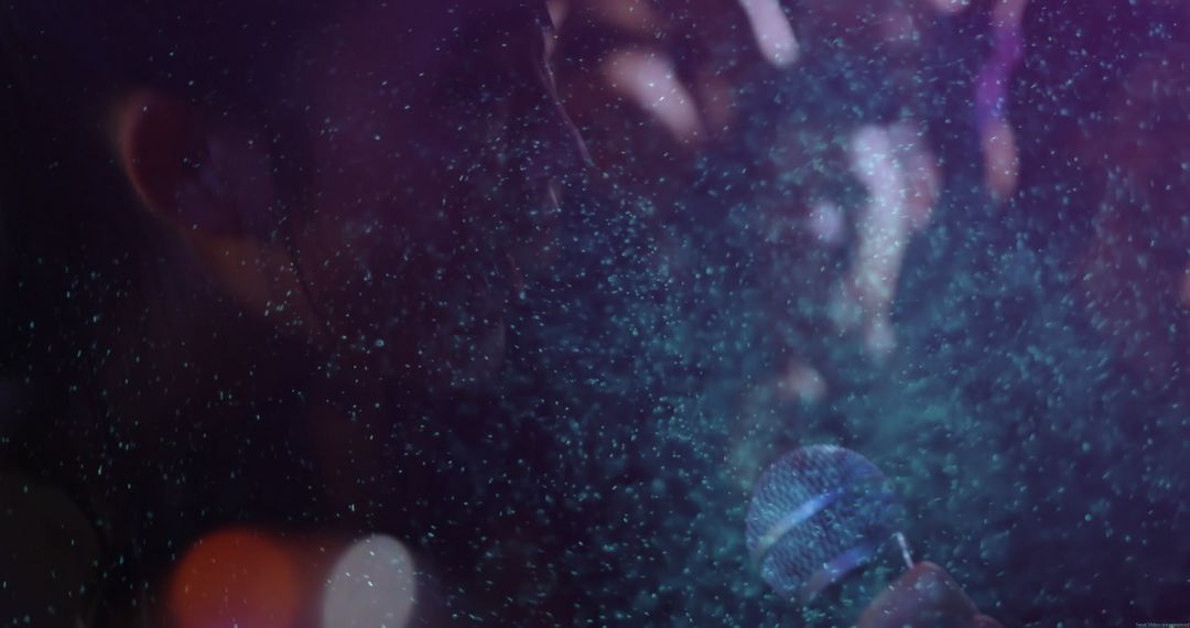 Female Singer Performing on Stage with Dramatic Lightning and Mist