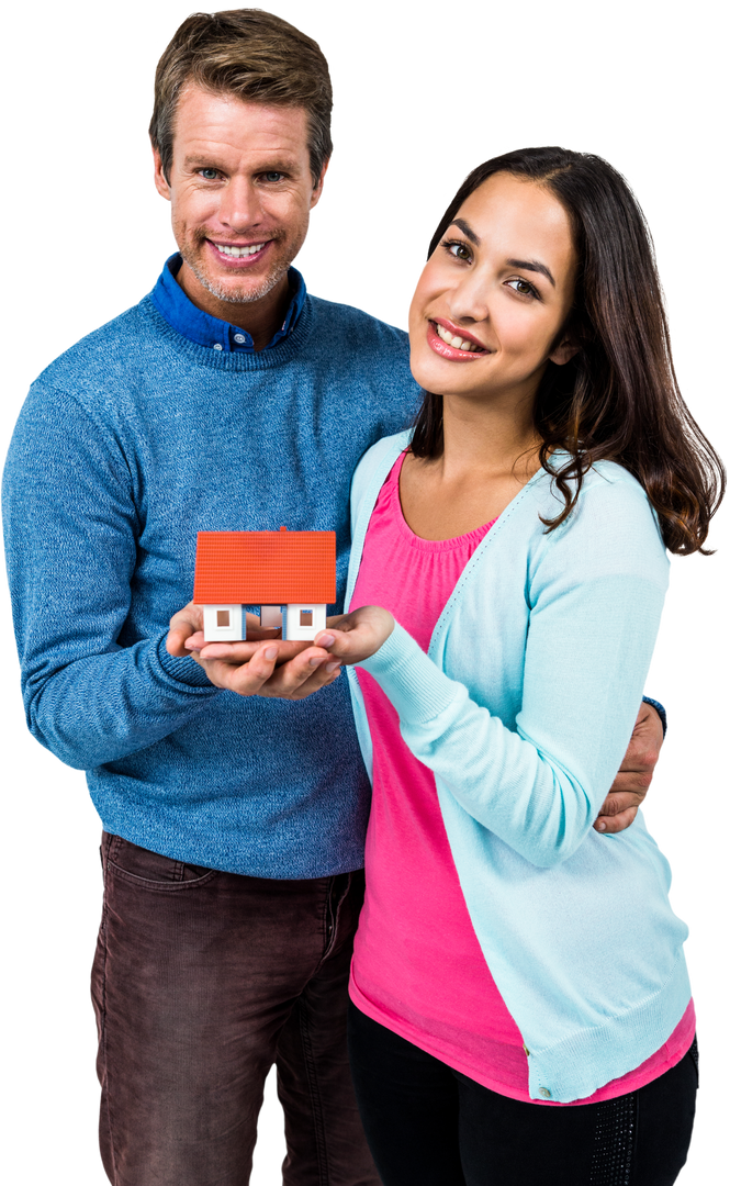 Smiling Couple Holding a Transparent House Model, Embracing Home Ownership - Download Free Stock Images Pikwizard.com