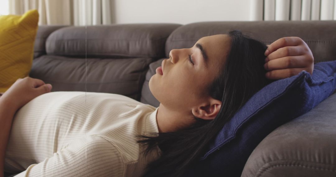 Woman Relaxing on Sofa with Surreal Time Warp Visualization
