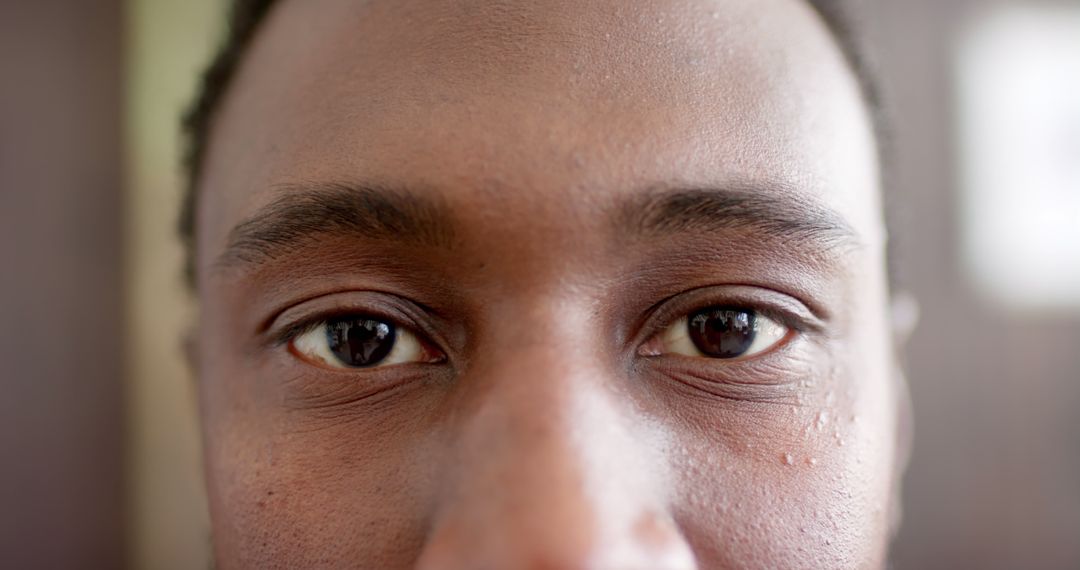 Close-up of Middle-Aged African American Man's Eyes Looking Thoughtfully - Free Images, Stock Photos and Pictures on Pikwizard.com