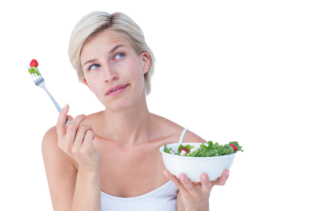 Thoughtful blonde woman eating fresh salad on transparent background - Download Free Stock Images Pikwizard.com