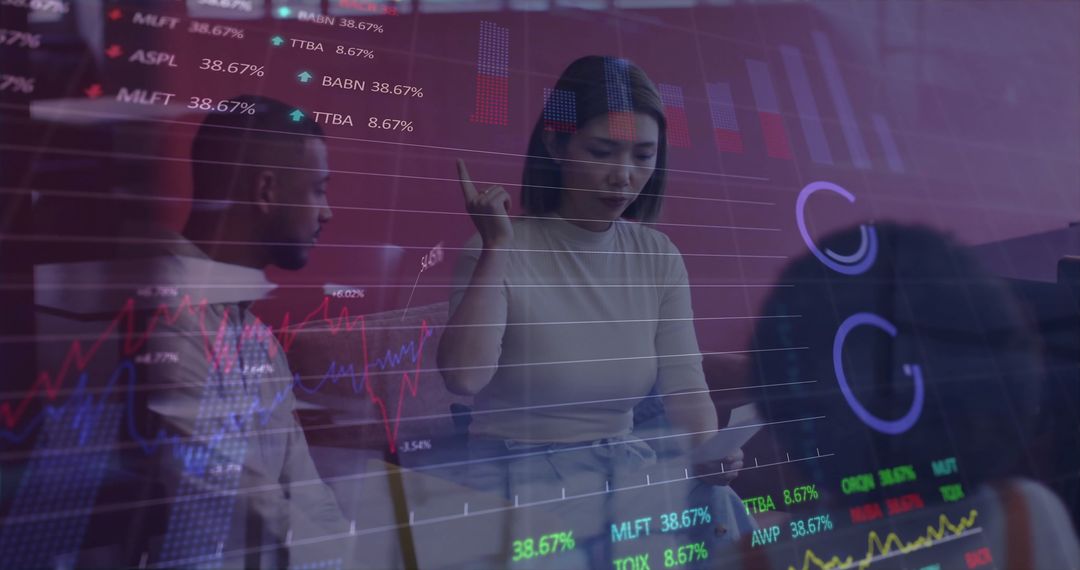 Business Colleagues Analyzing Financial Charts and Data Trends