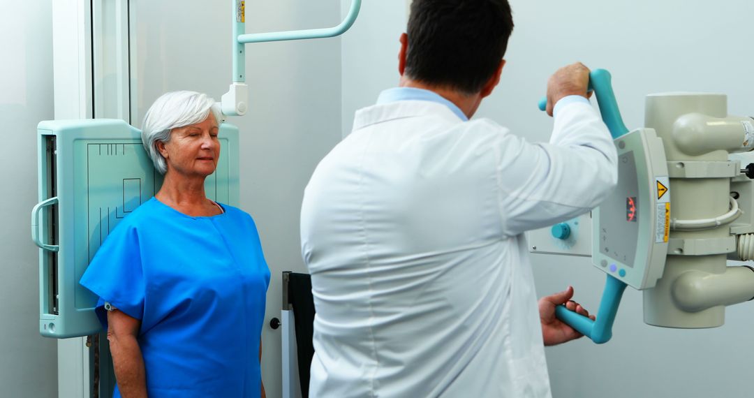 Senior Woman Getting X-ray from Radiologist at Hospital - Free Images, Stock Photos and Pictures on Pikwizard.com