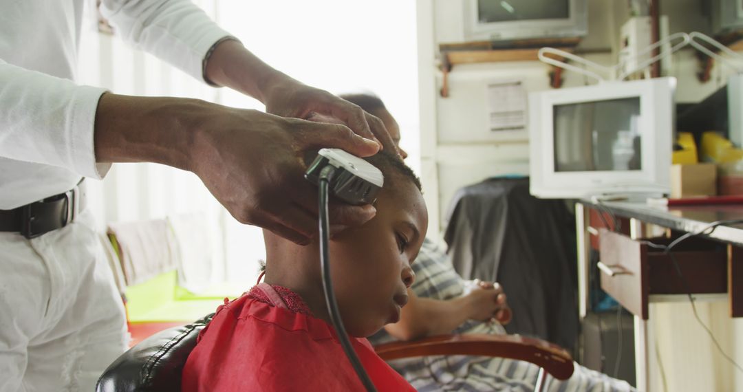 Child Getting Haircut at Barber Shop - Free Images, Stock Photos and Pictures on Pikwizard.com