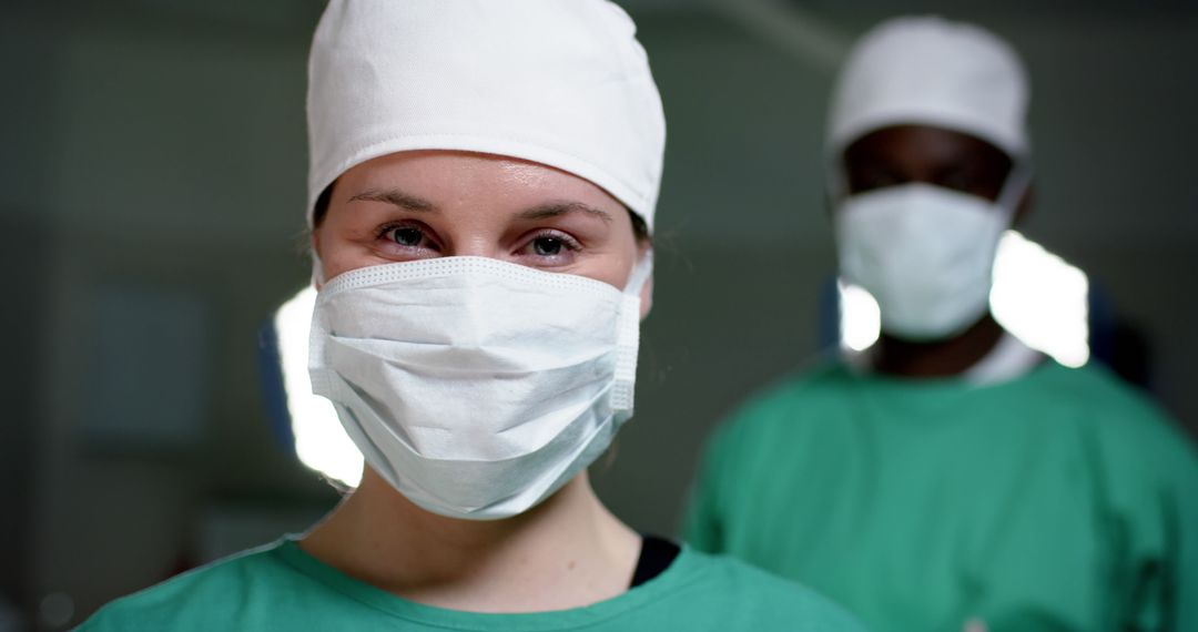 Healthcare Workers Wearing Masks in Medical Environment - Free Images, Stock Photos and Pictures on Pikwizard.com