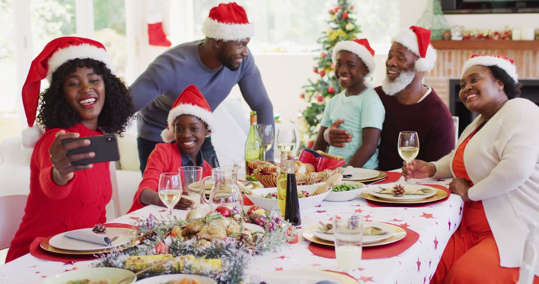 African Family Enjoying Christmas Dinner and Taking Selfie Together - Free Images, Stock Photos and Pictures on Pikwizard.com