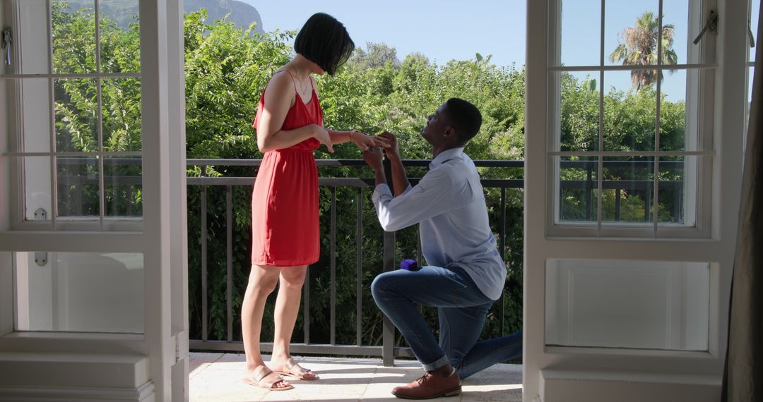Romantic Proposal on Balcony with Lush Greenery