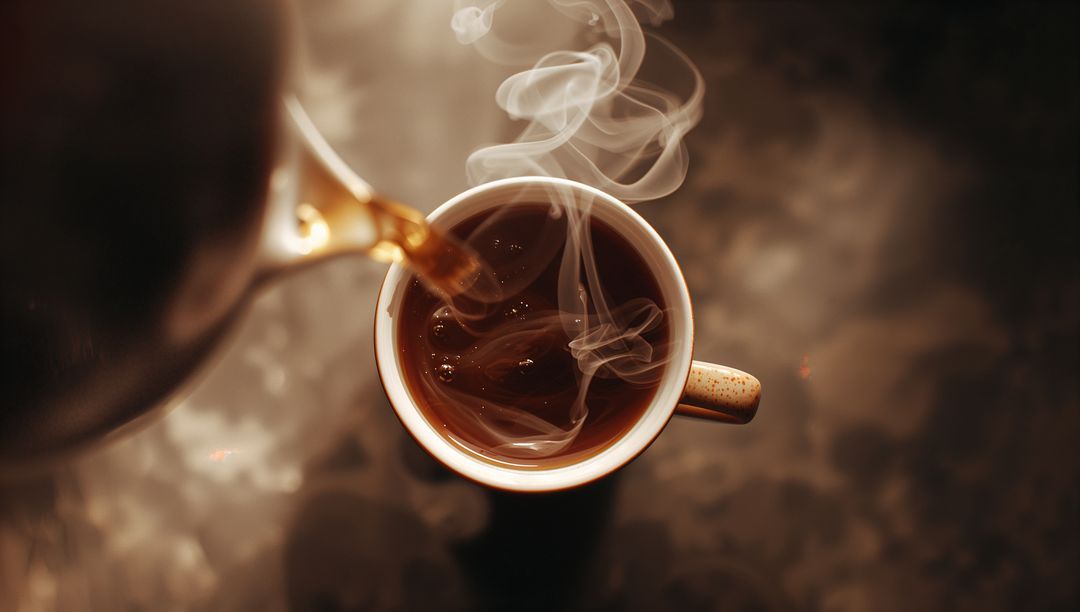 Steaming Hot Coffee Pouring into Mug
