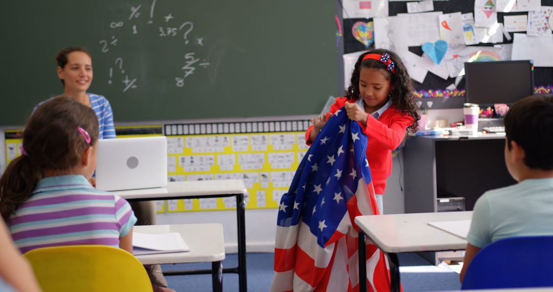 Schoolgirl Presenting American Flag in Classroom Setting
