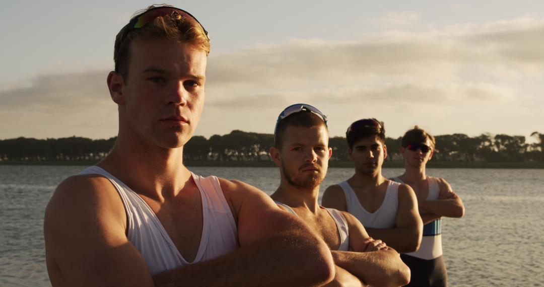 Confident Rowing Team Standing by Lake During Sunset - Free Images, Stock Photos and Pictures on Pikwizard.com