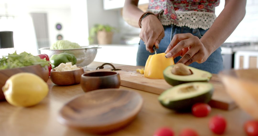 Preparing Fresh Ingredients for a Healthy Meal in a Modern Kitchen