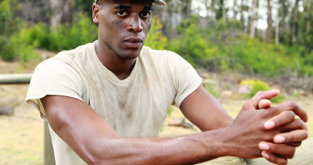 Tired Soldier Resting Outdoors After Training Session - Free Images, Stock Photos and Pictures on Pikwizard.com