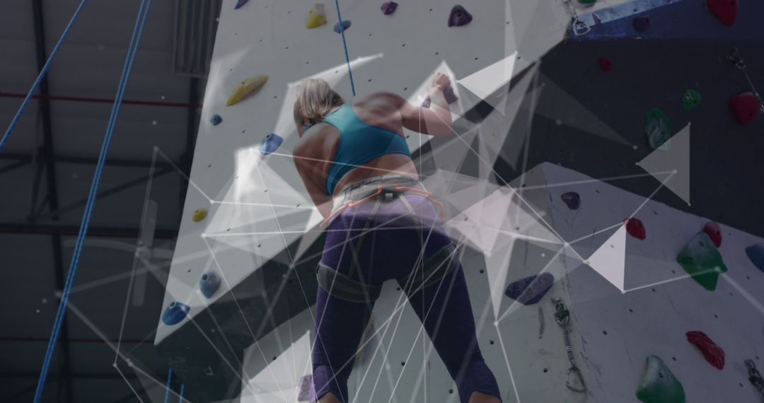 Woman Rock Climbing Under Digital Overlay of Data Processing