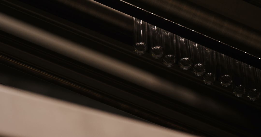 Glass Test Tubes on Moving Production Line in Factory