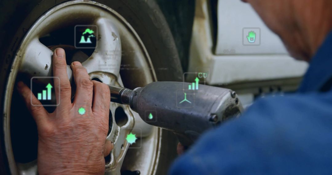 Mechanic stabilizing wheel hub operating impact wrench with AR telemetry and garage diagnostics