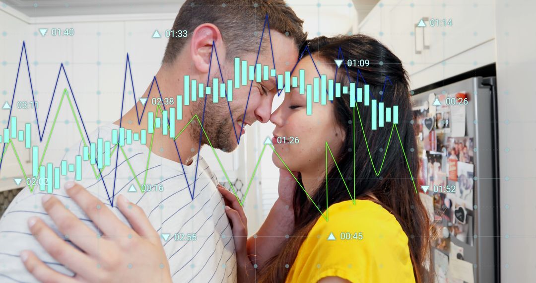 Couple Dancing in Kitchen with Financial Graph Overlay Concept