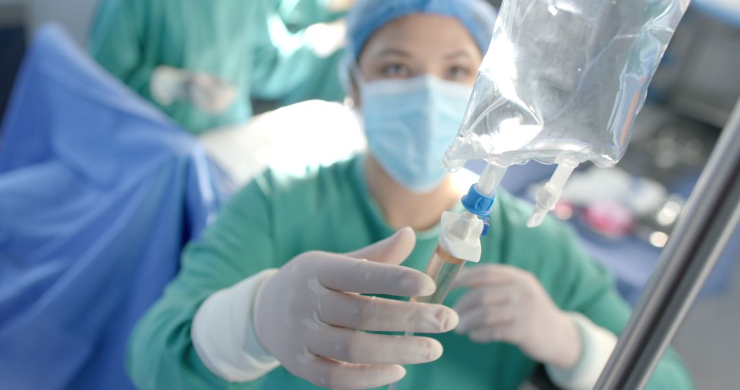 Surgeon Adjusting IV Drip in Modern Operating Room