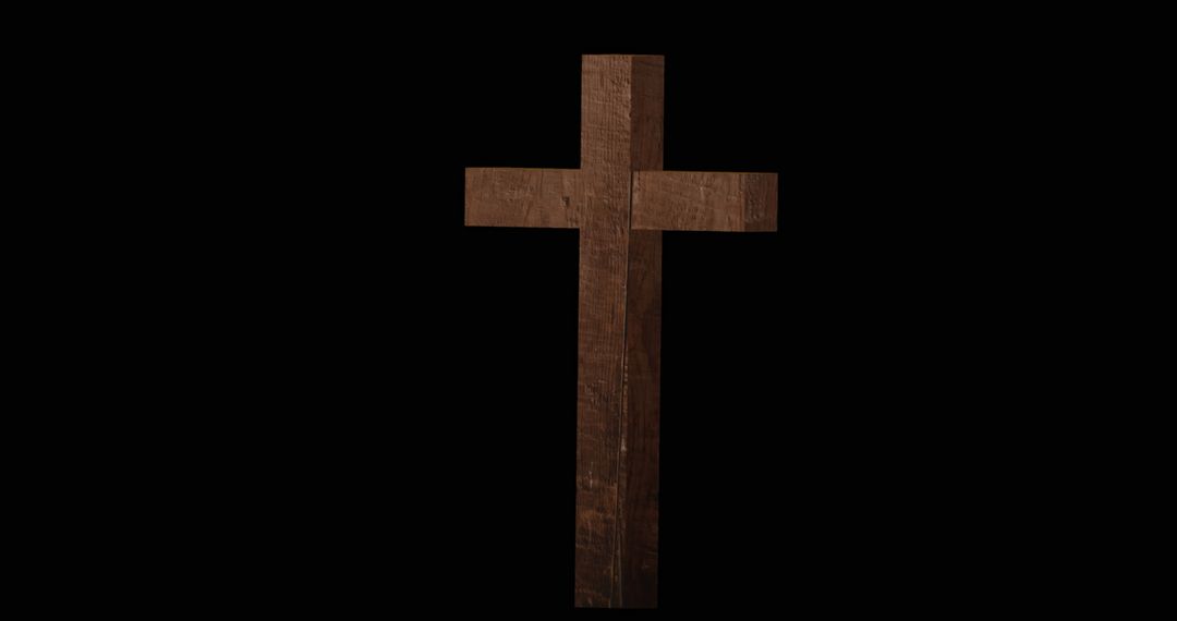 Wooden Cross Isolated on Black Background Signifying Christianity