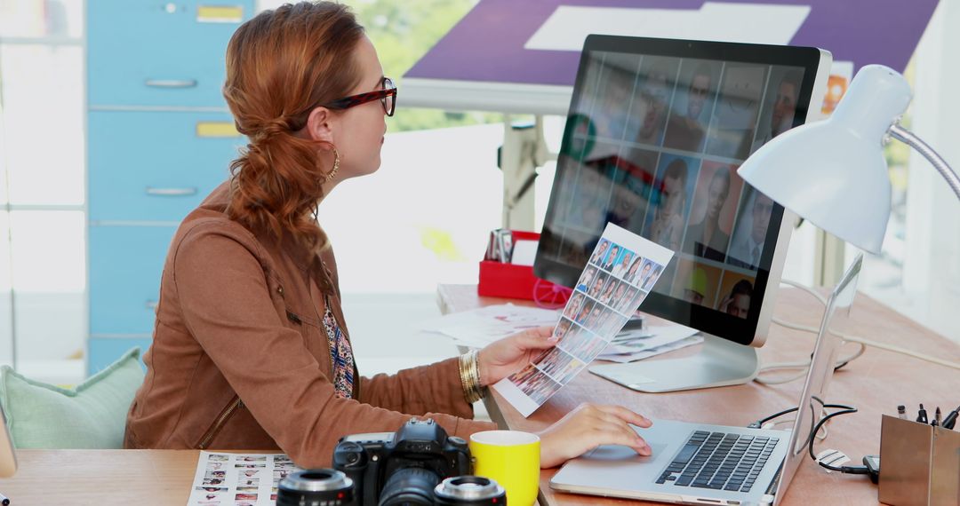 Woman Working with Photos on Computer in Creative Studio - Free Images, Stock Photos and Pictures on Pikwizard.com